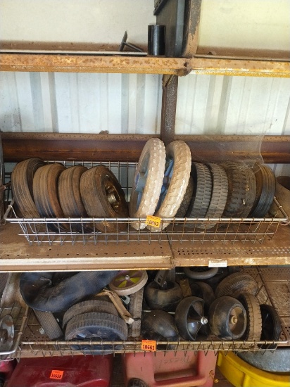 Tires on top shelf, lawnmower tires