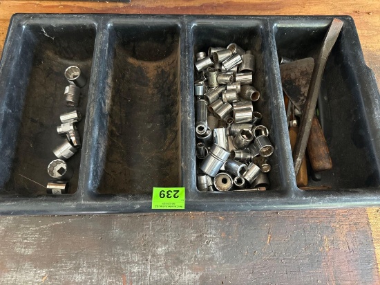 Sockets in plastic container