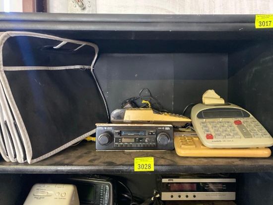 4 calculators, car radio and cloth collapsible storage container