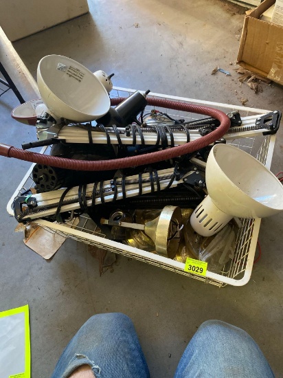 Metal basket full of light fixtures