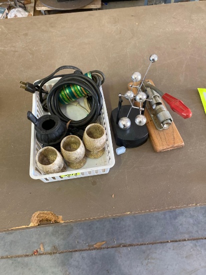 3 Fossilized marble boiled egg holders, homemade nut cracker, cords and tiny cast iron stove