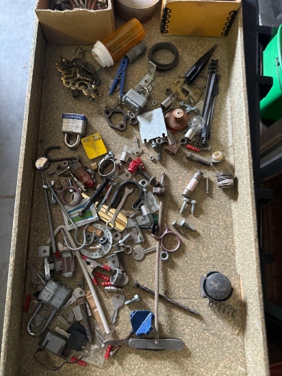 Nuts, bolts, screws, keys, wrench, and other hardware items