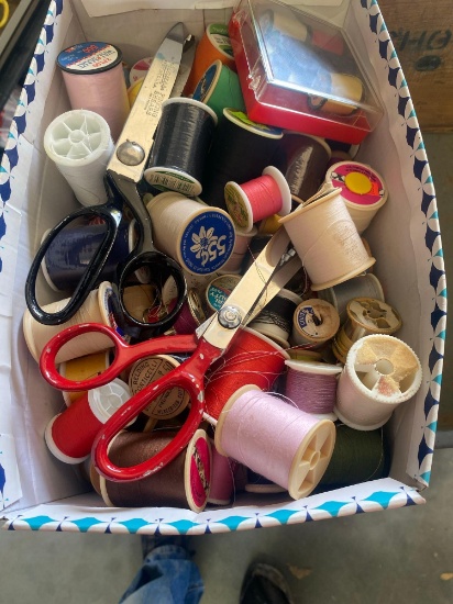 Box with sewing items thread, scissors