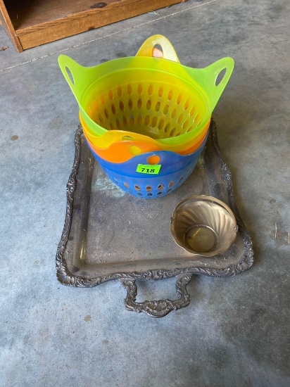 4 colorful baskets and a silver serving platter