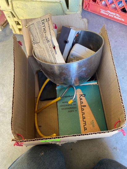 Four plug in timers, a silver bowl, real Orama, extension cord hanger, and photo albums