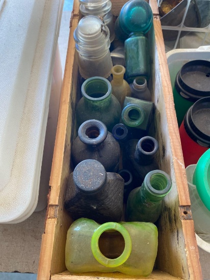 Glass insulators, A wooden box with glassware and vases