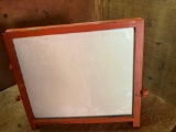 Small standing sign with chalkboard on one side and white board on the other