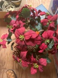 Christmas flowers and wood basket