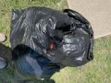 Trash bag full of pillows