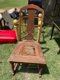 Wooden chair with wicker seat