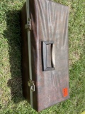Carrying case with vintage farm tools
