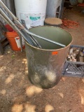 Metal barrel with miscellaneous aluminum pieces