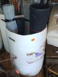 55 gallon barrel top cut off with rolls of screen