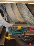 Miscellaneous tractor and lawnmower tires on top shelf ONLY