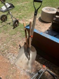 Snow shovel and tree loppers