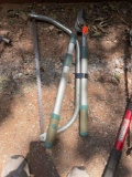 Hand saw and tree loppers