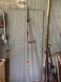Pole saw blade attached to wood pole