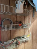 Wire wall hanging with items springs,clamping light, other misc items