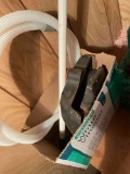 Vacuum hose, roller with handle and miscellaneous item inbox