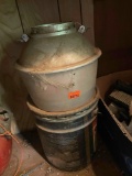 Large outdoor light and a 5 gallon metal bucket of unknown content