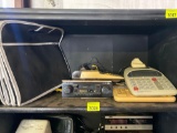 4 calculators, car radio and cloth collapsible storage container