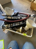 Metal basket full of light fixtures