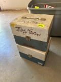 2 empty metal boxes