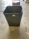 Metal trash can with brackets and reflectors