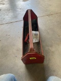 Rivet gun with rivets in metal tool caddie
