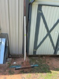 2 rakes and a shop broom