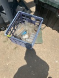 Metal floor dolly and plastic containers