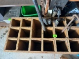 Wooden yard tool organizer with several misc items