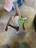 Wooden tool caddy with hand drill, hammer and clamp light