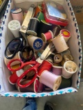 Box with sewing items thread, scissors