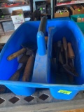 Blue carrying caddy with hammer, garden tools and more