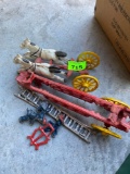 Vintage cast iron Horse drawn fire wagon hook ladder with 2 horses and drivers