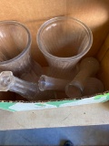 Box of various size vases