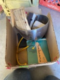 Four plug in timers, a silver bowl, real Orama, extension cord hanger, and photo albums