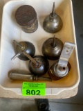 Vintage small oil dispensers one of them does have singer imprinted