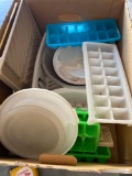 Plastic ice trays, dish strainer, microwave, bacon cooker, miscellaneous lids, and more