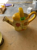 Decorative ceramic watering can with painted floral design
