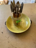 Ceramic coated lid and a cup with small garden utensils