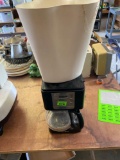 Coffee pot and trash can