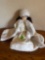 Porcelain doll and white with cape and hat