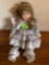 Porcelain doll and gray with pink trim