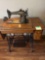 Antique singer sewing machine converted into electric foot petal and light. 36.5x18x30 inches. Bring