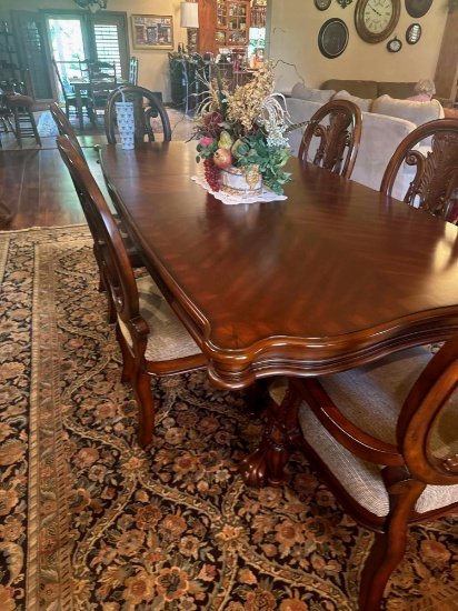 Formal Dinning table and 8 chairs. 95 x 43.5 x 30 inch table, items on table are not included, Bring
