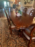 Formal Dinning table and 8 chairs. 95 x 43.5 x 30 inch table, items on table are not included, Bring