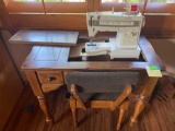Singer sewing machine table 20x33x31 inches and chair. Table does need repair. Bring help to move