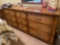 Bedroom suit, dresser, chest of drawers, 2 night stands, and queen size headboard with mattress.